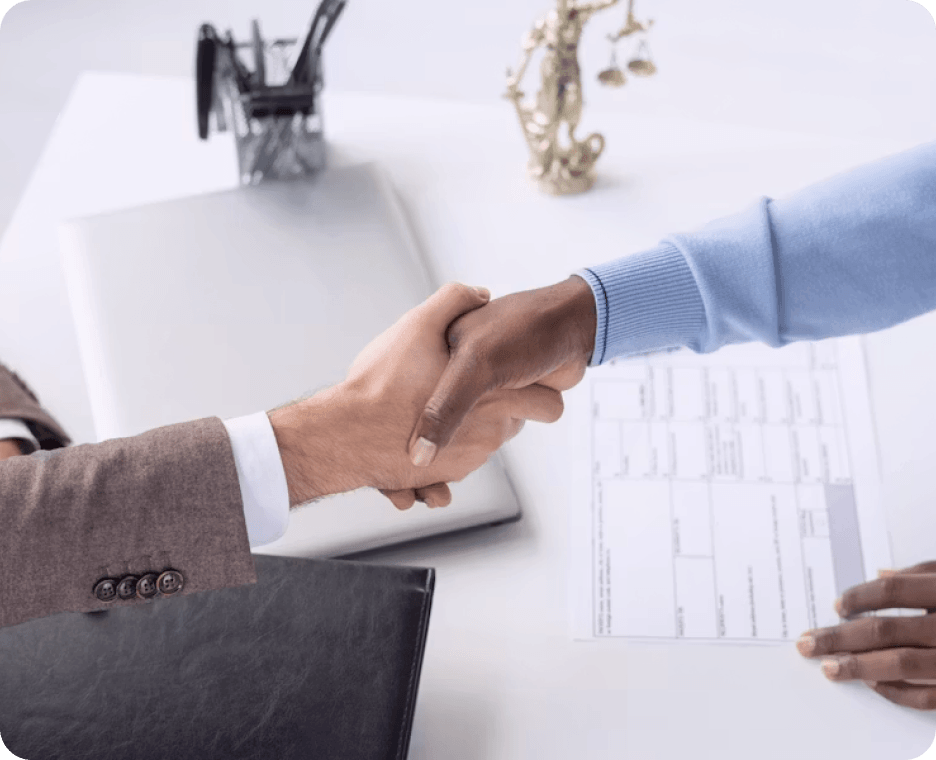 A business handshake marking an agreed review point